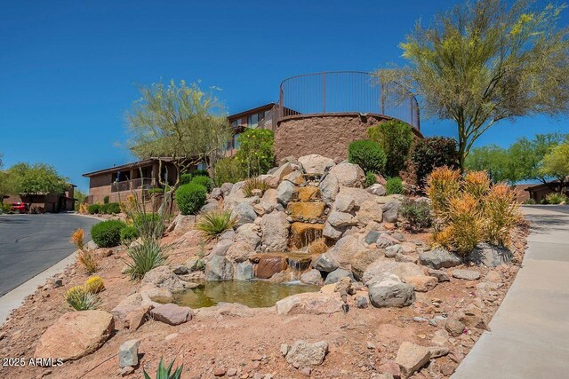 16248 E Ridgeline Dr, Fountain Hills, AZ 85268 - community sign with a garden pond