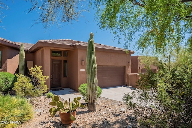 16248 E Ridgeline Dr, Fountain Hills, AZ 85268 - view of front of home featuring stucco siding, an attached garage, driveway, and a tiled roof