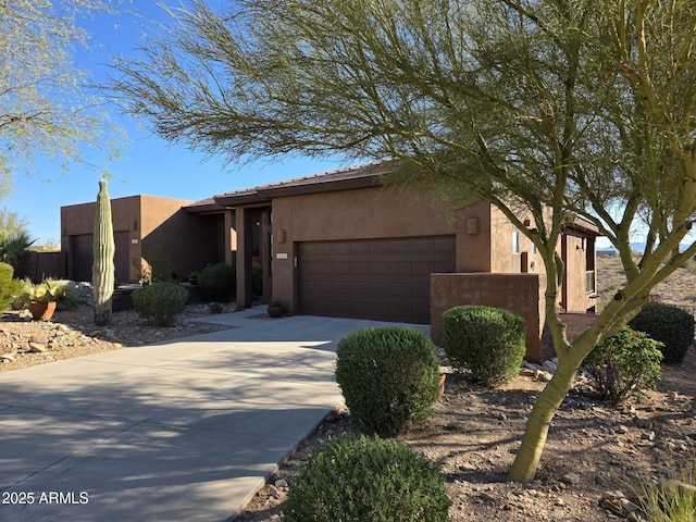 16248 E Ridgeline Dr, Fountain Hills, AZ 85268 - southwest-style home featuring stucco siding, driveway, and a garage