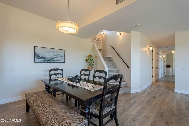 16248 E Ridgeline Dr, Fountain Hills, AZ 85268 - dining area with wood finished floors, visible vents, and baseboards