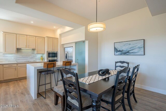 16248 E Ridgeline Dr, Fountain Hills, AZ 85268 - dining room with recessed lighting, light wood-style flooring, and baseboards