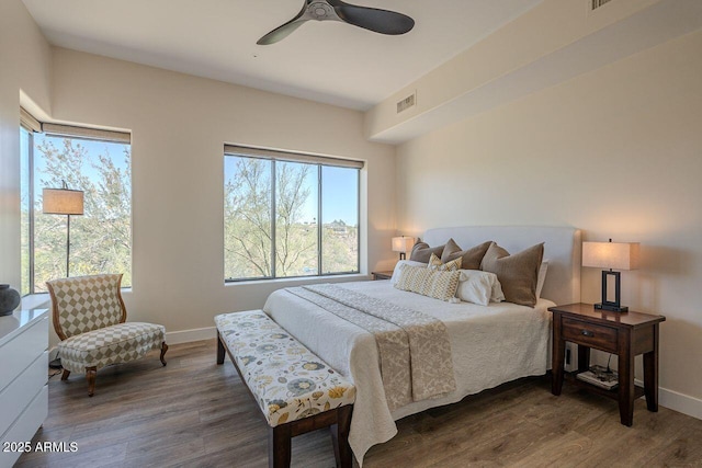 16248 E Ridgeline Dr, Fountain Hills, AZ 85268 - bedroom featuring visible vents, wood finished floors, baseboards, and ceiling fan