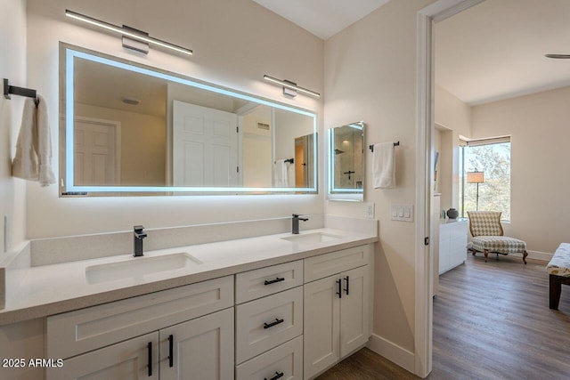 16248 E Ridgeline Dr, Fountain Hills, AZ 85268 - full bath with wood finished floors, connected bathroom, baseboards, and a sink