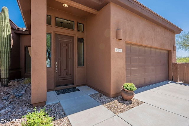 16248 E Ridgeline Dr, Fountain Hills, AZ 85268 - entrance to property with stucco siding, concrete driveway, and a garage