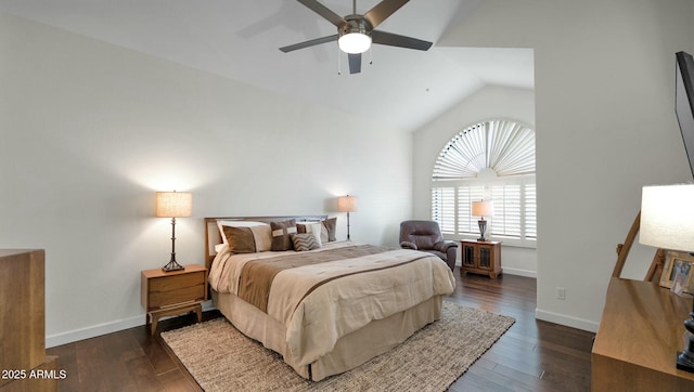 bedroom with ceiling fan, dark hardwood / wood-style flooring, and vaulted ceiling