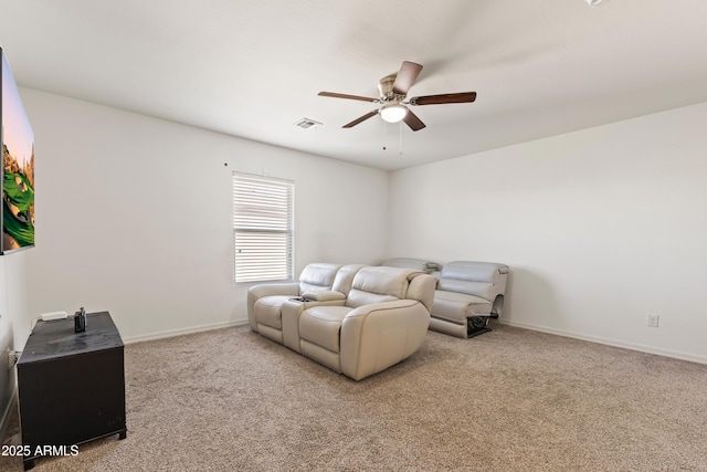carpeted bedroom featuring baseboards, visible vents, and ceiling fan