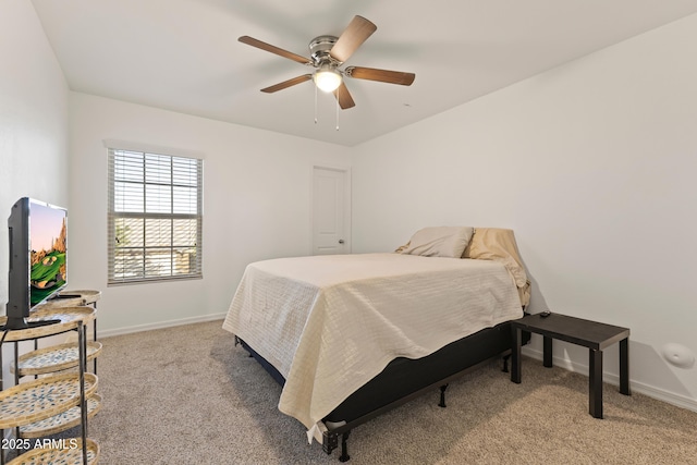 bedroom featuring baseboards, ceiling fan, and carpet flooring