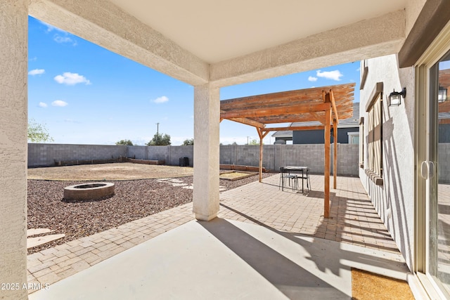 view of patio / terrace with a pergola and a fenced backyard