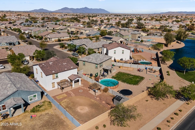 birds eye view of property featuring a residential view and a mountain view