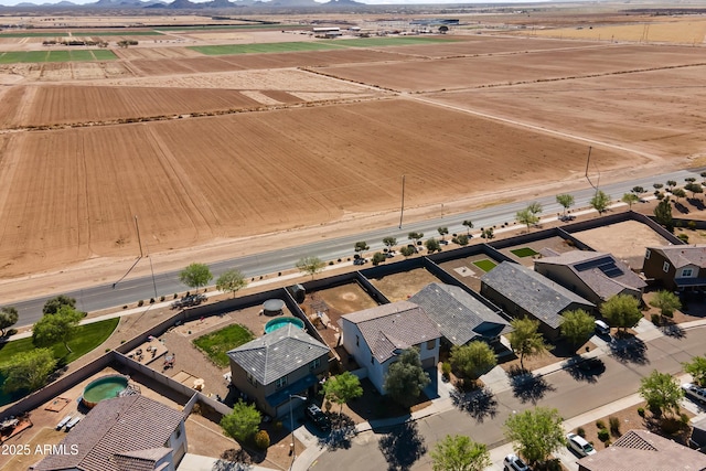 bird's eye view featuring a rural view and a mountain view