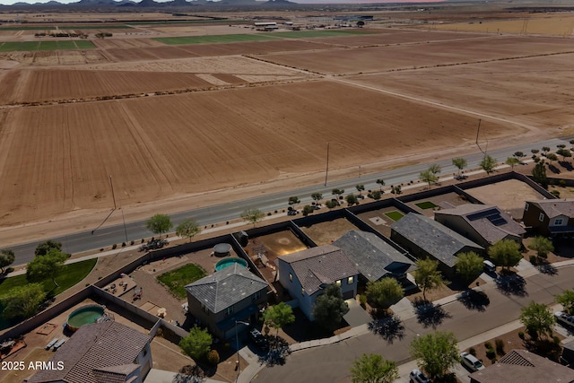 birds eye view of property featuring a mountain view