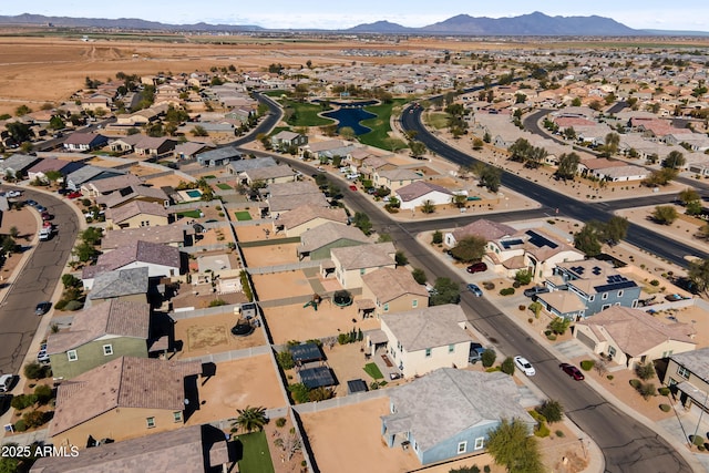 aerial view featuring a mountain view and a residential view