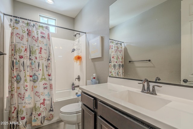 full bathroom with vanity, shower / bath combination with curtain, and toilet