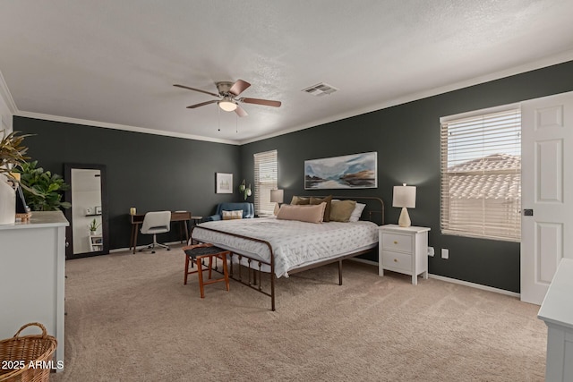 bedroom featuring light colored carpet, multiple windows, and visible vents