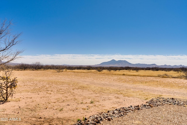 view of mountain feature with a rural view