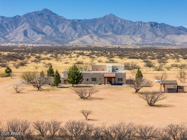 view of mountain feature featuring a desert view and a rural view