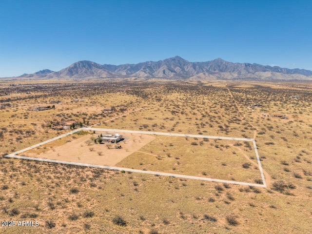 aerial view with view of desert and a mountain view