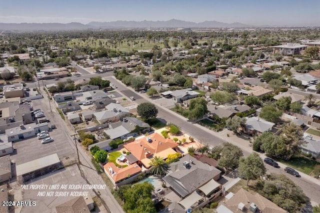 drone / aerial view featuring a mountain view