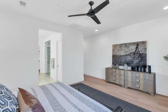 bedroom featuring light wood-type flooring and ceiling fan