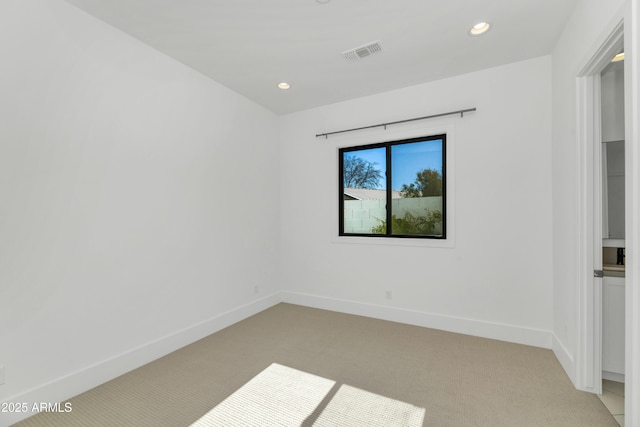 view of carpeted spare room