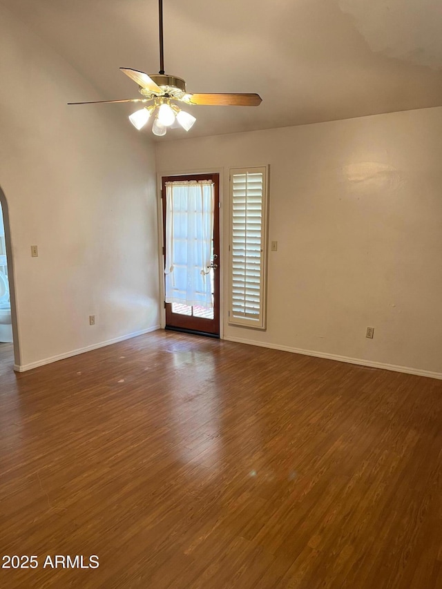 6223 N 12th St Unit 1, Phoenix, AZ 85014 - empty room featuring wood finished floors, ceiling fan, and arched walkways