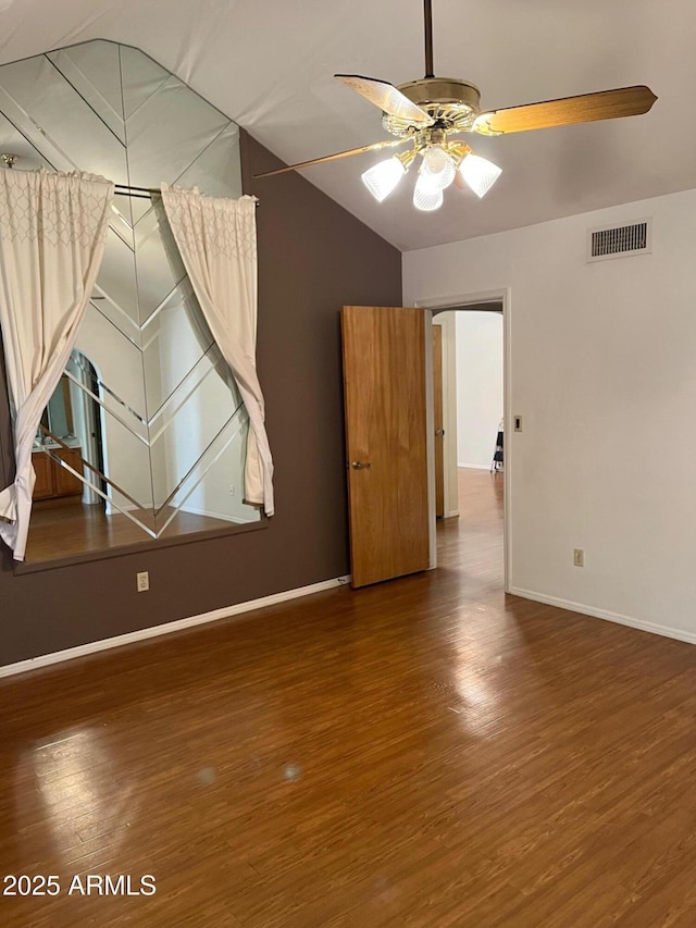 6223 N 12th St Unit 1, Phoenix, AZ 85014 - spare room featuring ceiling fan, wood finished floors, and lofted ceiling