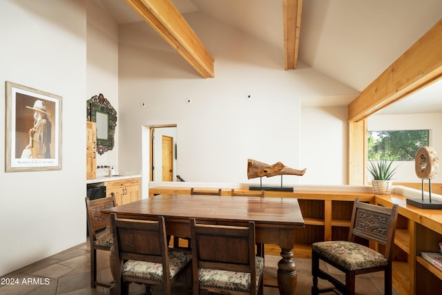 dining area featuring lofted ceiling