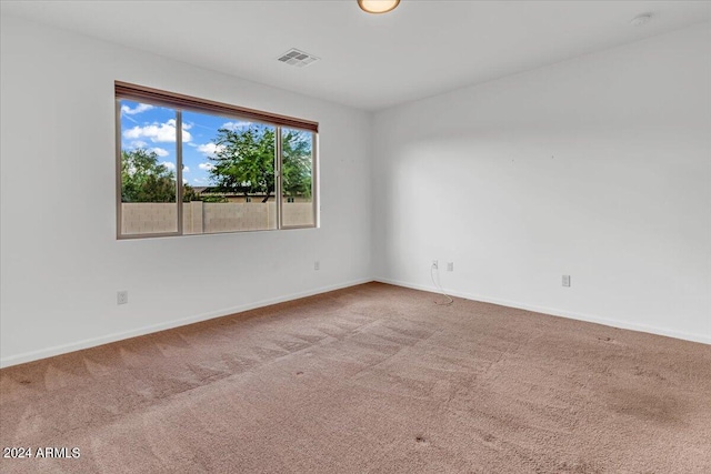 unfurnished room with carpet flooring