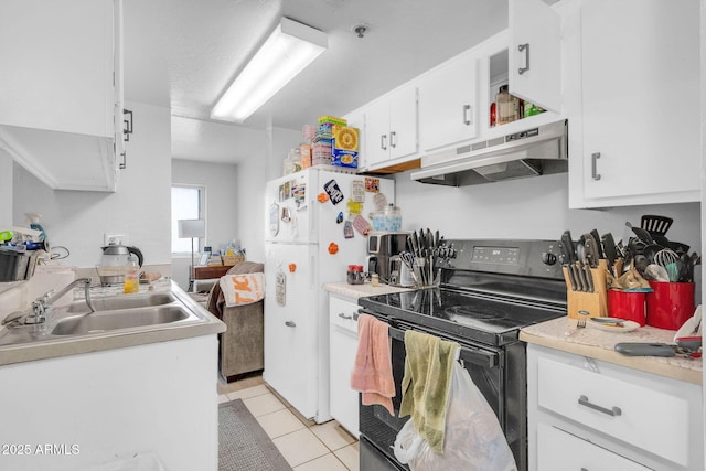 kitchen with black electric range oven, under cabinet range hood, a sink, light countertops, and light tile patterned floors