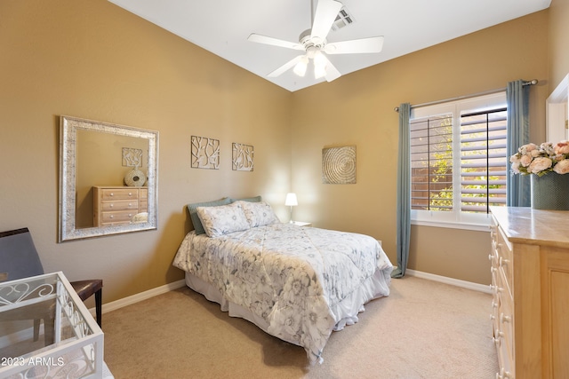 bedroom featuring visible vents, a ceiling fan, baseboards, and light carpet