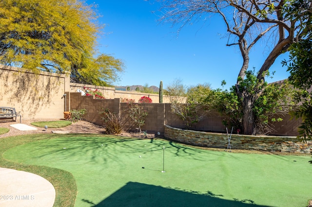 exterior space featuring a fenced backyard