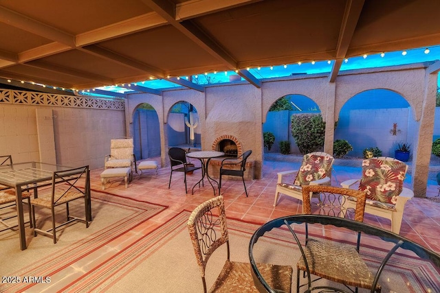 7736 E Hazelwood St, Scottsdale, AZ 85251 - view of patio with fence and exterior fireplace