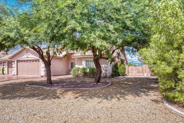 view of front of property with a garage