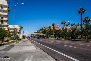 view of street featuring sidewalks and street lighting