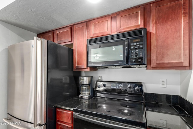 kitchen with black appliances and a textured ceiling