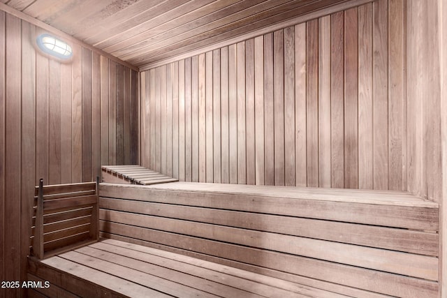 relaxing sauna with wooden walls and wood ceiling