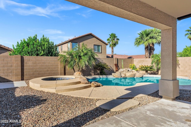 view of swimming pool with a fenced in pool, a patio, an in ground hot tub, and a fenced backyard