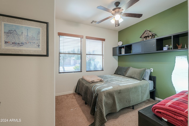 carpeted bedroom with ceiling fan