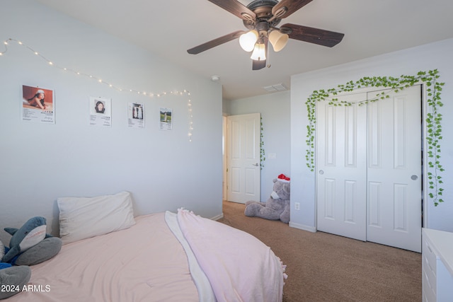 bedroom featuring ceiling fan and carpet