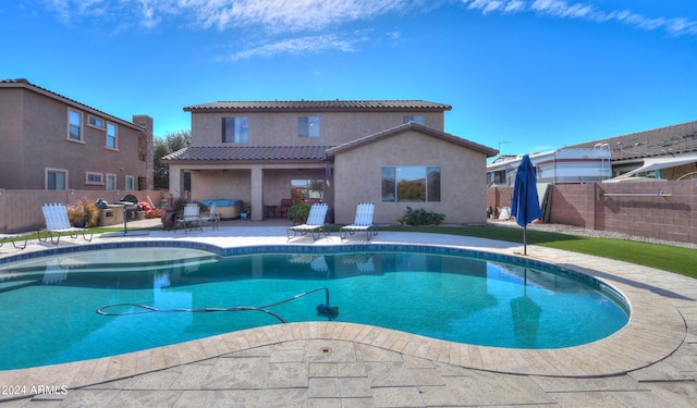 view of pool featuring a patio area