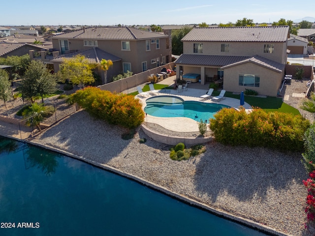 view of swimming pool with a patio