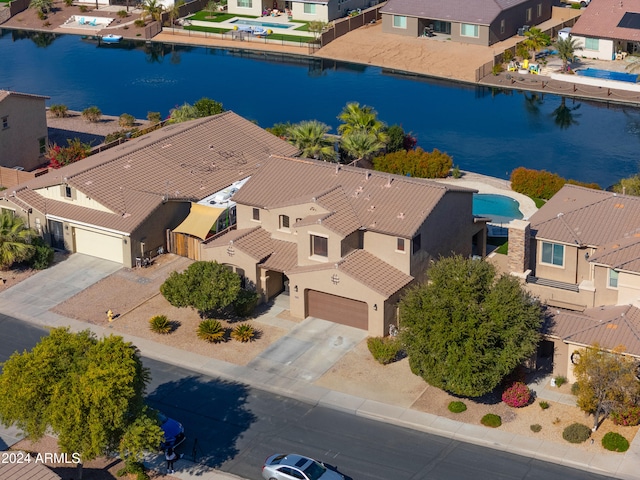 drone / aerial view featuring a water view