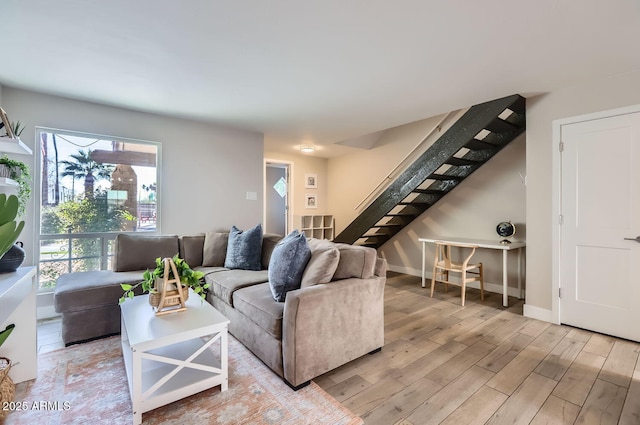 living room with light hardwood / wood-style floors