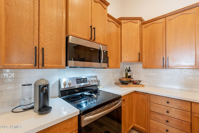 1635 E Harrison St, Chandler, AZ 85225 - kitchen featuring appliances with stainless steel finishes and backsplash