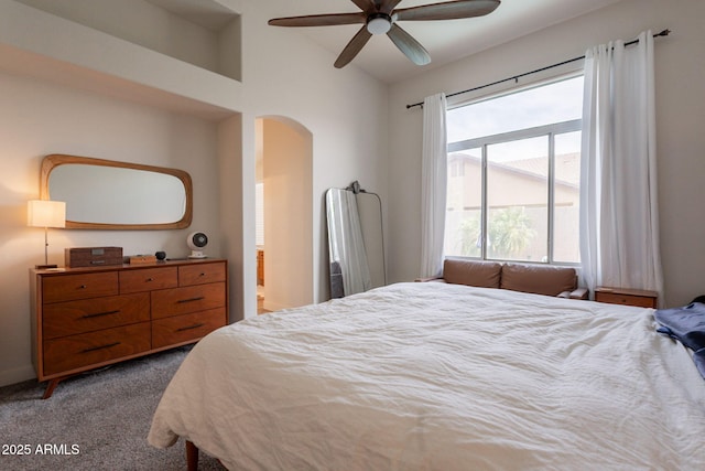 1635 E Harrison St, Chandler, AZ 85225 - bedroom with arched walkways, carpet, and a ceiling fan