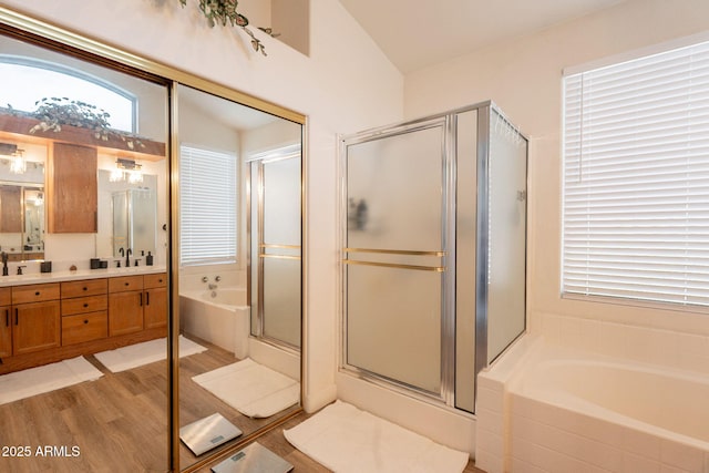 1635 E Harrison St, Chandler, AZ 85225 - bathroom featuring vanity, a bath, a stall shower, wood finished floors, and lofted ceiling
