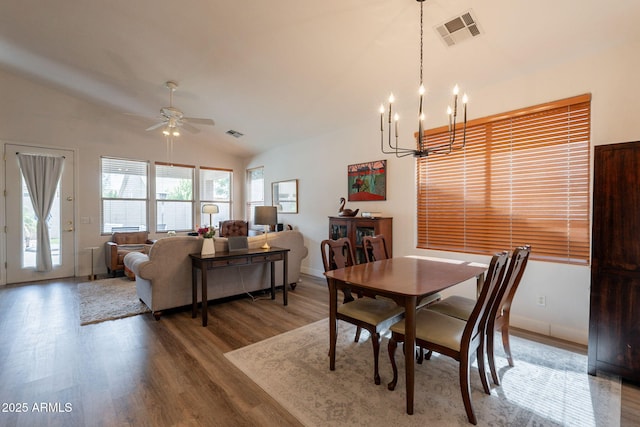 1635 E Harrison St, Chandler, AZ 85225 - dining space featuring lofted ceiling, a chandelier, wood finished floors, ceiling fan, and baseboards