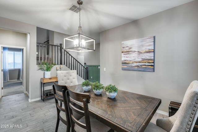 dining area with a chandelier