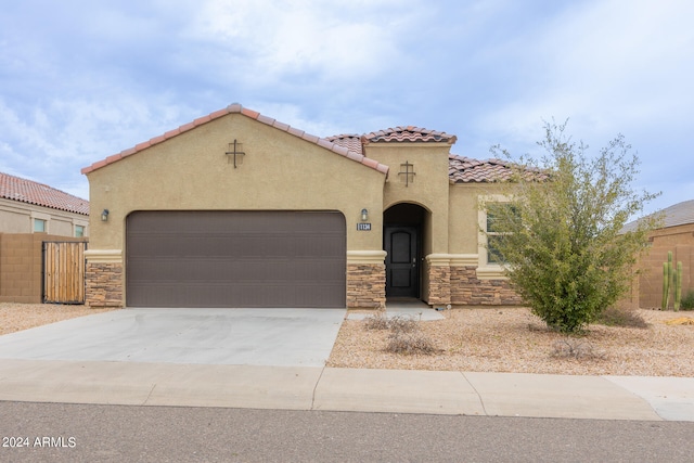 1134 E Palm Parke Blvd, Casa Grande, AZ 85122 - mediterranean / spanish home with a garage