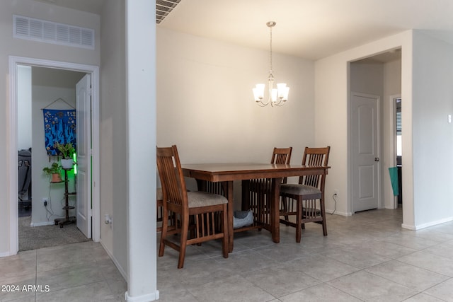 dining area with a chandelier